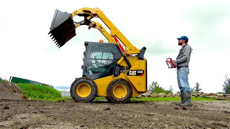 caterpillar 242d skid steer with the torc robotics|RC ADVENTURES .